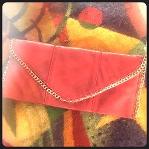 Sexy gold trimmed red leather clutch ❤️